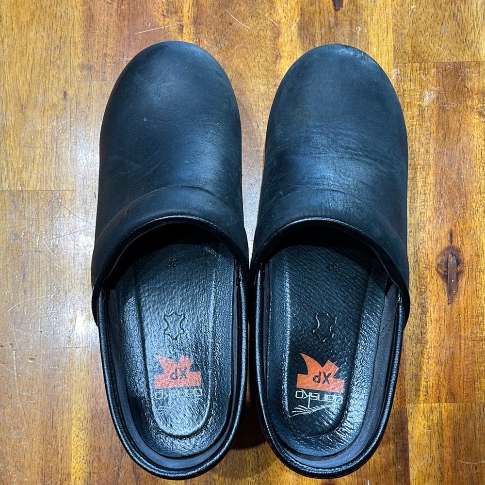 Dansko XP black leather clogs. Great condition.